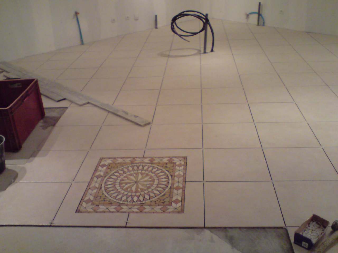 Pose de carrelage avec mosaïque 